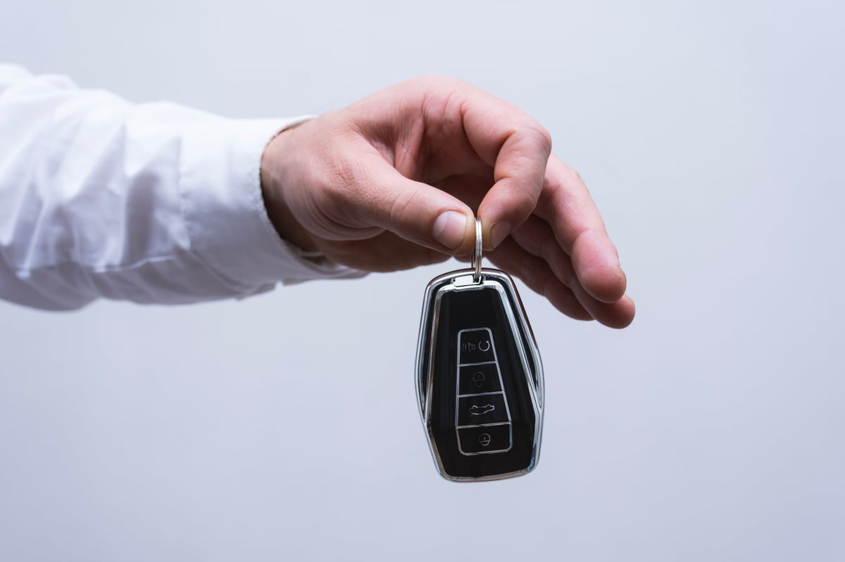 Luxury car key on white background