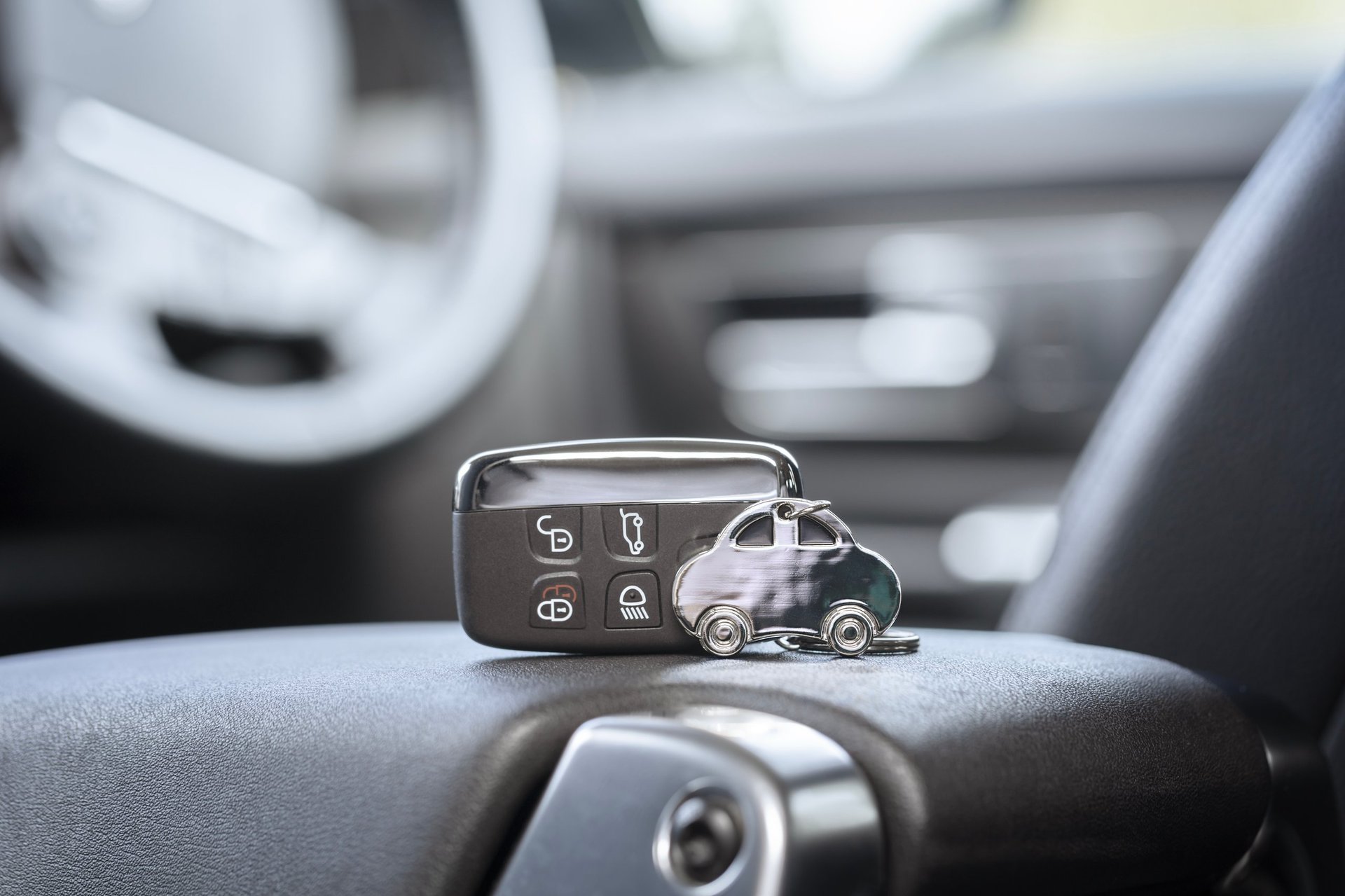 Car key and keyring in car interior